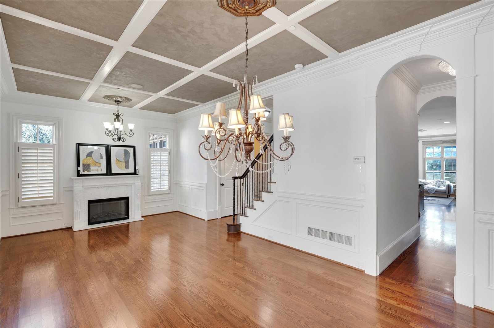 Bright interior with warm wood floors and detailed ceiling, from the authorized Stonehall collection