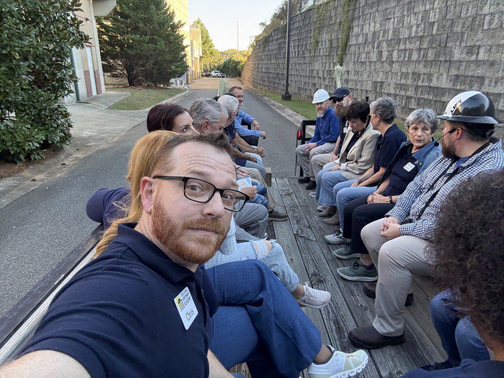 Cobb 101 class participants seated together during a group tour